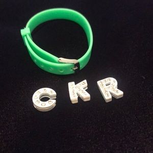 Green bracelet with sparkly charms